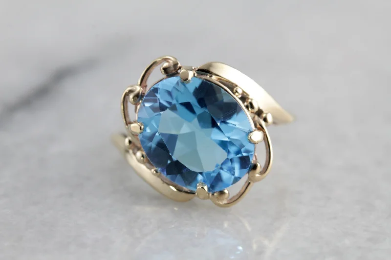 Electric Blue Topaz Gold Cocktail Ring