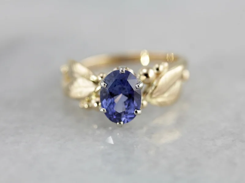 Indigo Sapphire Gemstone set in a Vintage Leaf and Berry, Botanical Themed Setting