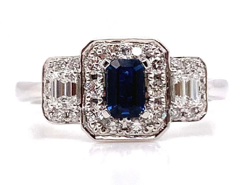 Platinum 0.55ct Sapphire And 0.46ct Diamond Three Stone Emerald Cut Halo Ring