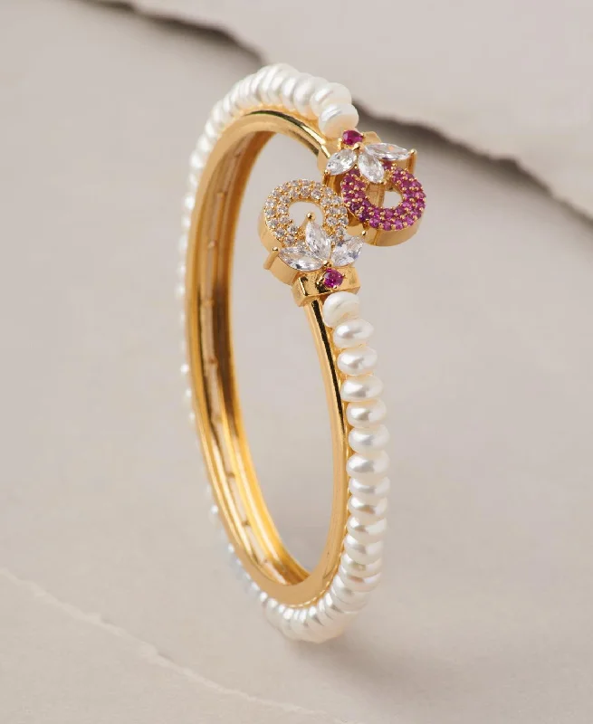 Floral Stone Studded Pearl Bangle