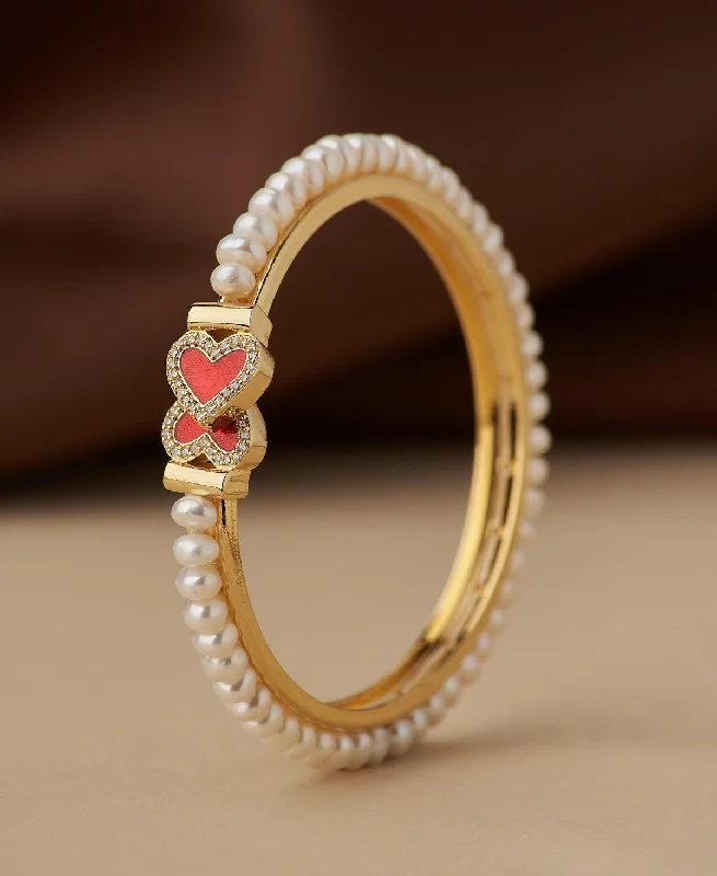 Heart Stone Studded Pearl Bangle