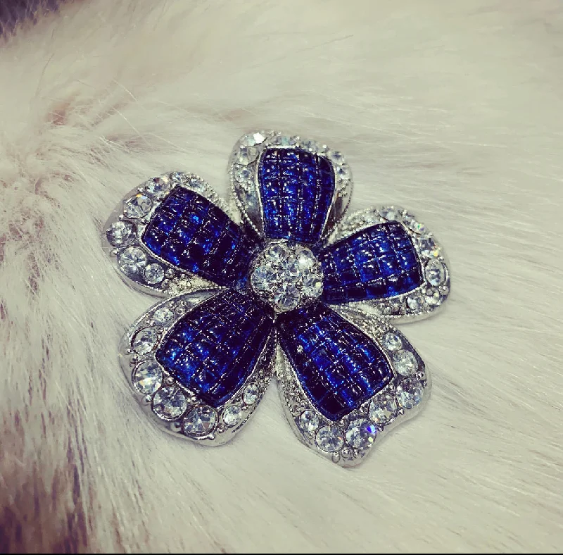 Sapphire blue vintage brooch by Avon