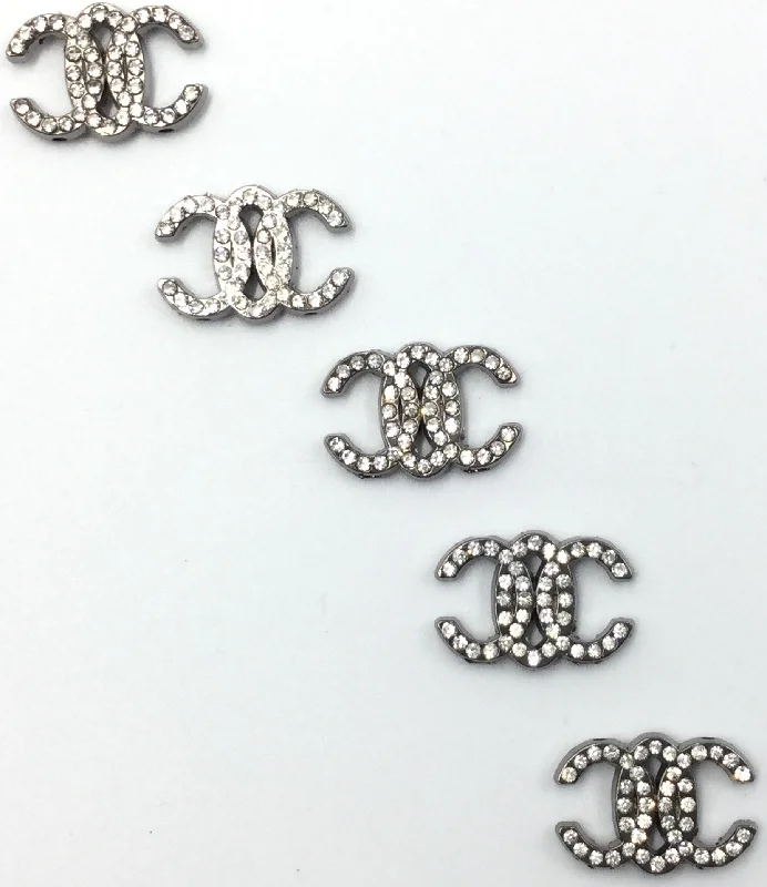 Silver Chanel Shaped Badges